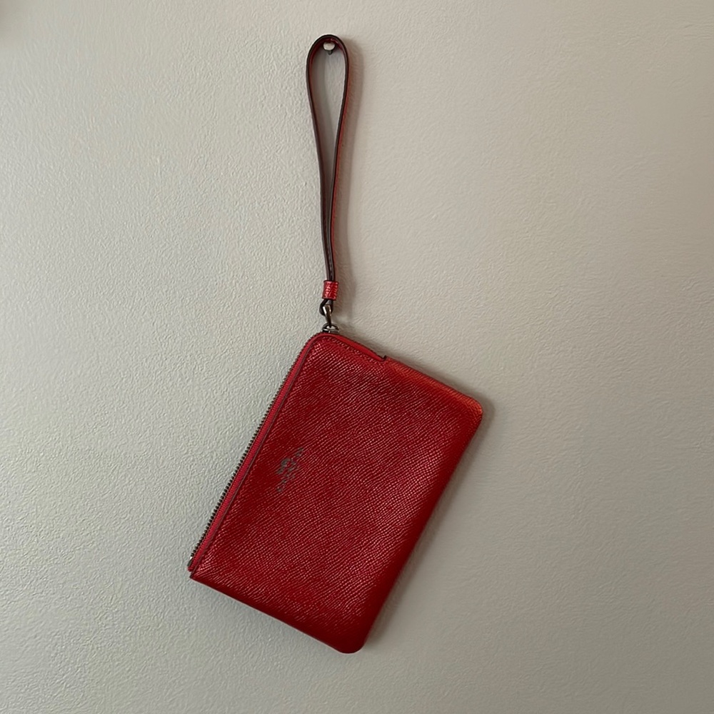 Ruby red Coach clutch bag.